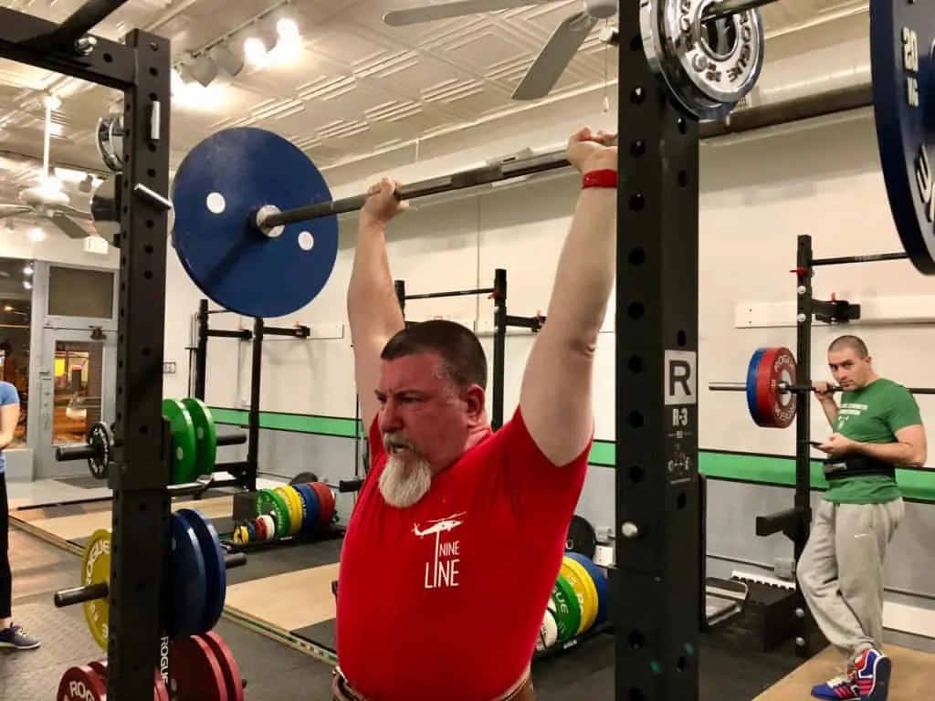 Kevin Hammond pressing 60 kilograms